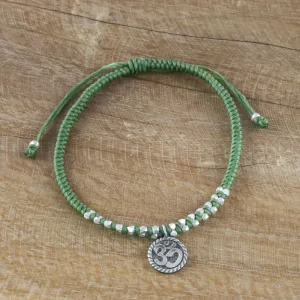 Ancient Om in Green Silver Om Charm Bracelet on Braided Green Cords