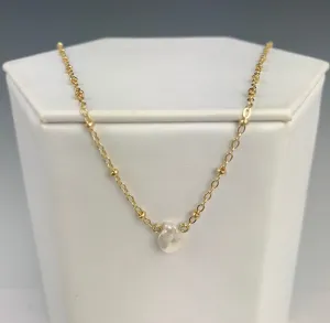 Side to Side Gold Pearl Necklace