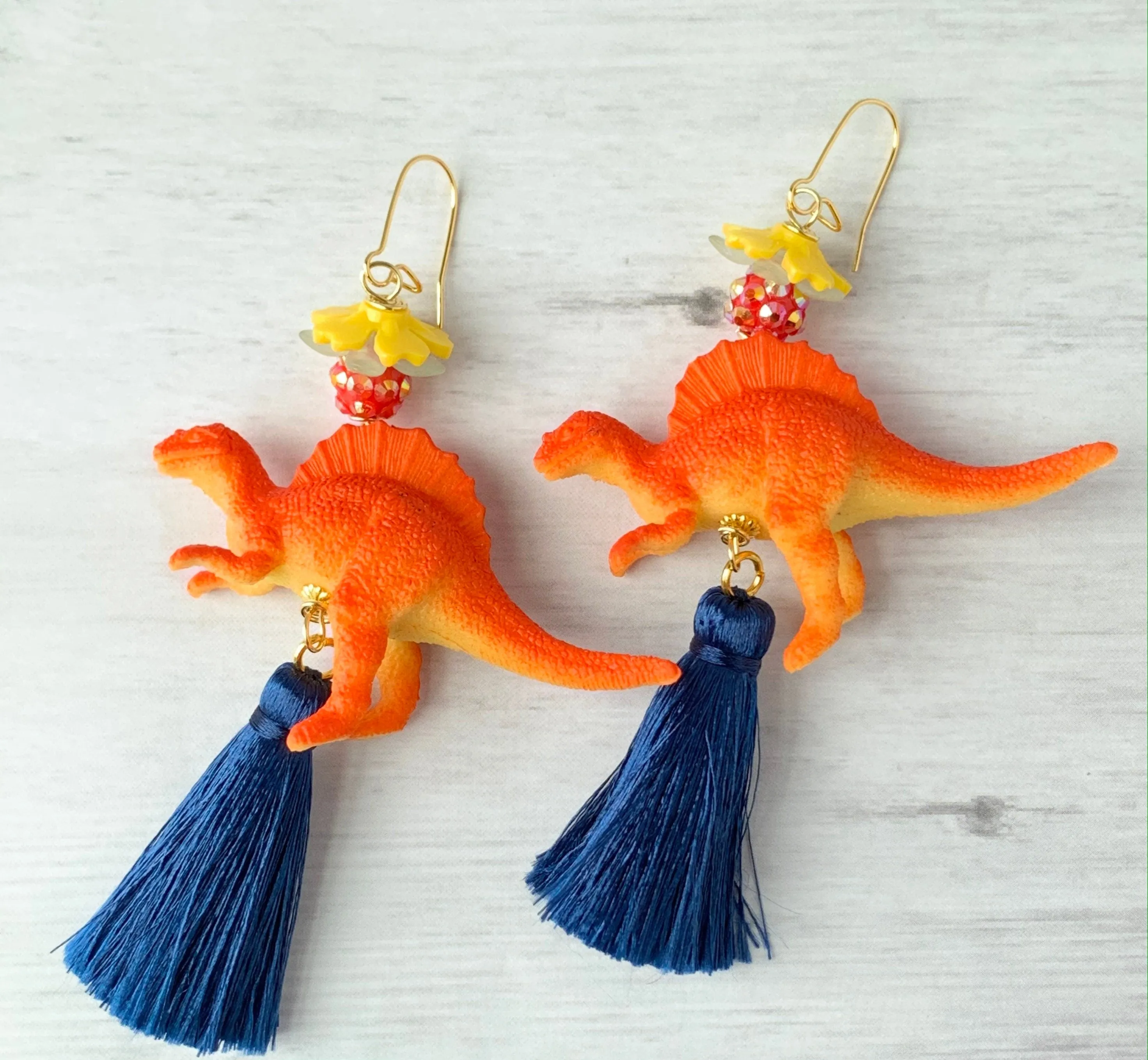 Tangerine Spinosaurus Tassel Earrings