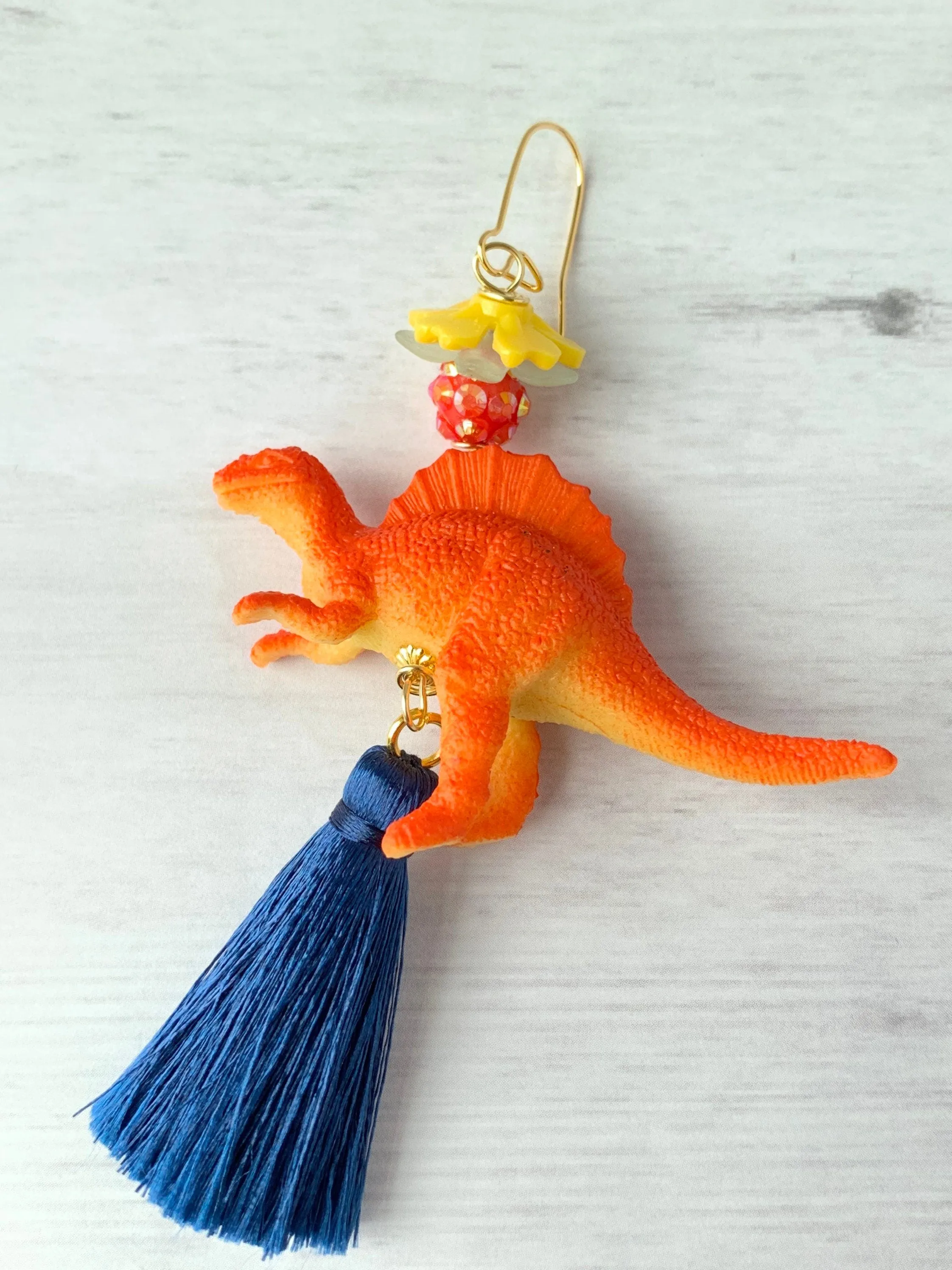 Tangerine Spinosaurus Tassel Earrings